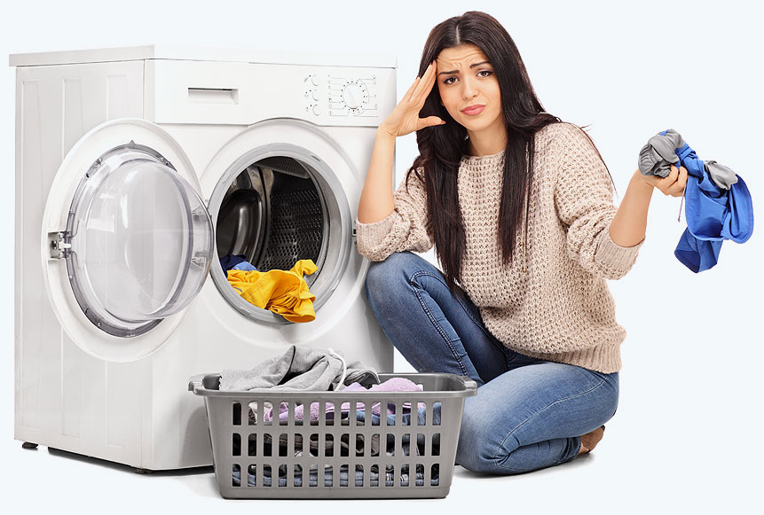 Woman squatting near laundry services machine